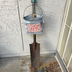 Rustic Shovel With Plant Holder And Insulator On Top