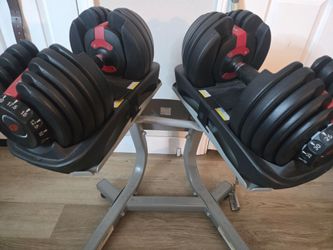 Bowflex weights with stand and bench