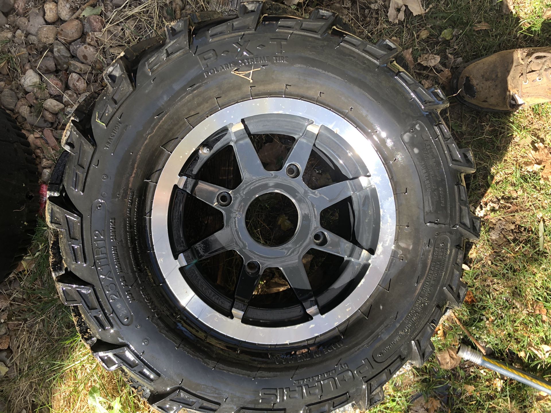 One Polaris extreme tire and rim 26x11 r 12 was off a Polaris Ranger 4 lug wheel