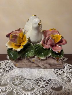 Authentic Capodimonte, Made in Italy (stamped on base with the classic Crown 'N' mark).