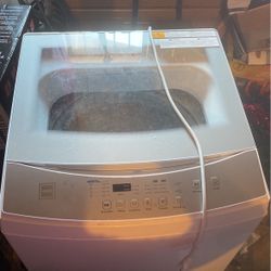 Top load RCA Washer Electric.