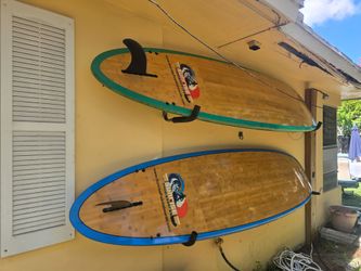 2 paddle boards w/paddles
