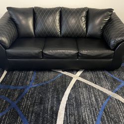 Black Leather Sofa & Rug & ottoman 