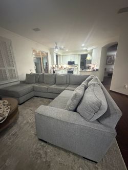 Jerome’s Gray Sectional Couch – $333 Used