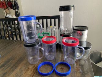 Magic Bullet mini blender with a lot of accessories cups