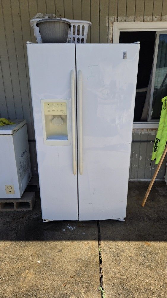 White GE Profile Arctica Side-by-Side Refrigerator