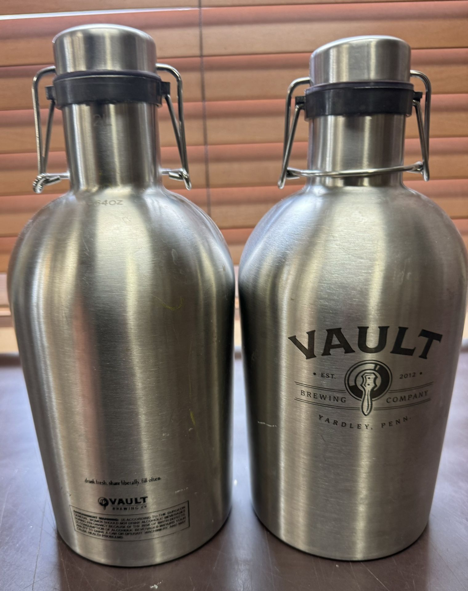 2 Vault Brewing Co SS Growlers