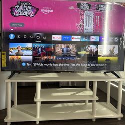 55” TCL 4K Smart TV (Less than 1 Year Old) + TV Stand