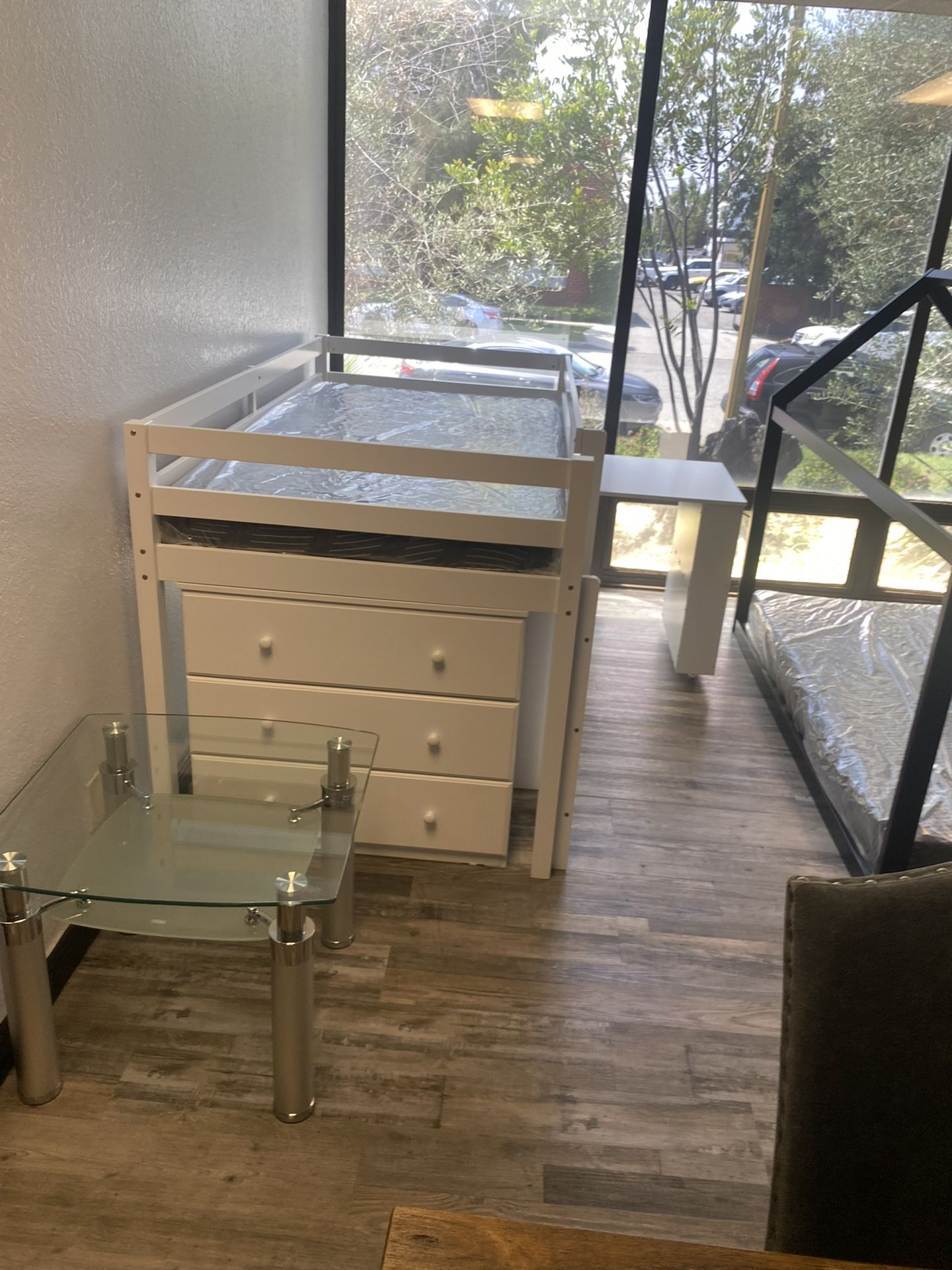 Twin loft bed with desk, bookcase & chest. Available in white & grey. Assembly required. Assembly not included tax included. Free local delivery.   $4