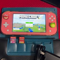 Nintendo Switch Lite. Pink, Comes With 3 Games. Looks Brand New. Perfect Screen. Great Holiday Gift