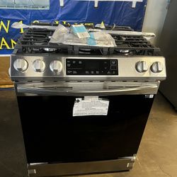 NEW OPEN BOX SAMSUNG STAINLESS STEEL SLIDE IN 30”