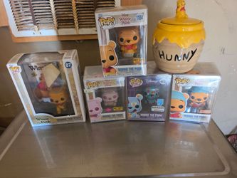Winnie the Pooh a Funko pops and jar