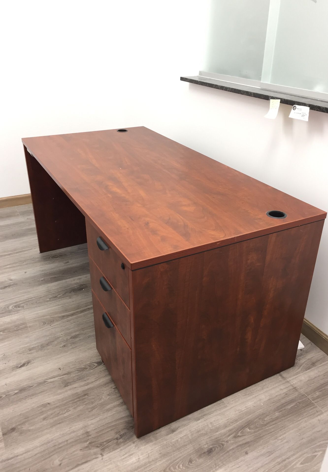Three secretarial desks available, two with return sides