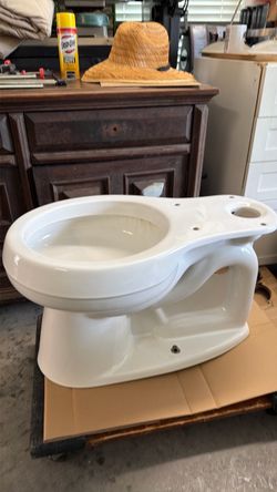 White Toilet bowl, tank and tank lid. For free