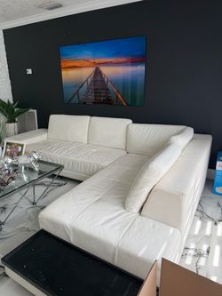 All leather white sectional from el dorado and table for 6 people