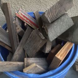 Barrel full of scrap wood for burning