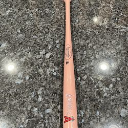 MLB Los Angeles Angels 18 inches Pink  Mini Wooden Baseball Bat.  Brand Louisville.  Preowned.  Has been on display in a cabinet with an Angels Baseba