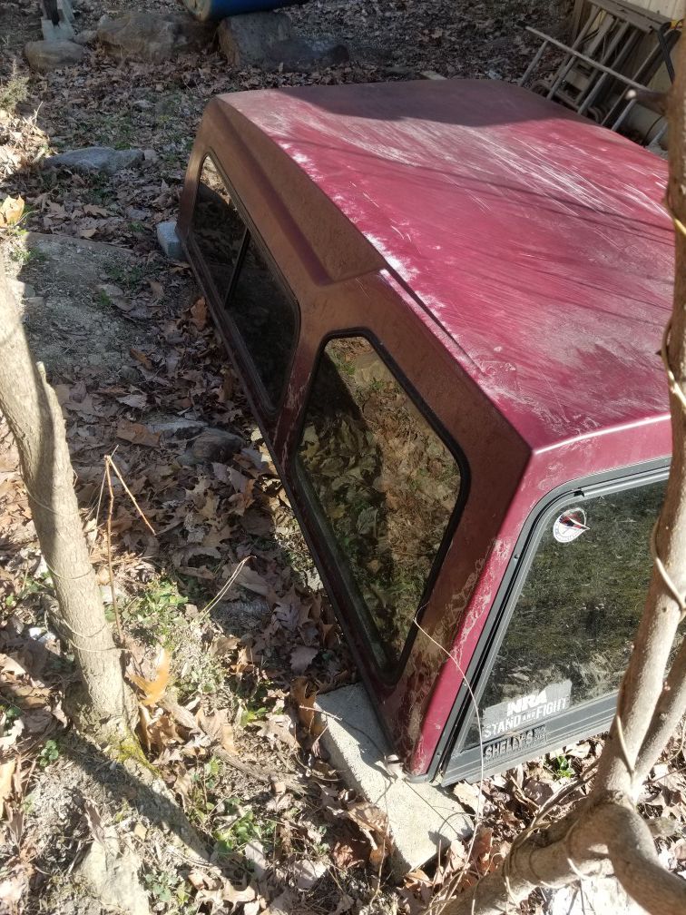 Maroon camper shell $250 obo