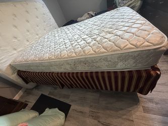 box spring with its mattress (Queen)