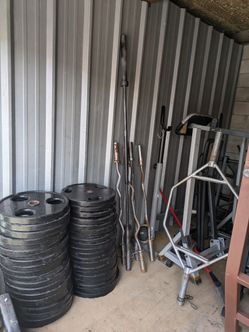 Olympic Plates, Curl Bars, Benches, Racks, Smith Machine And More!