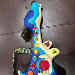 B. Toys Dog Guitar 