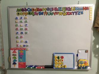 Magnetic white board with magnets. 4’ x 3’