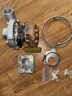 Aftermarket turbo intercooler & blowoff valve greddy