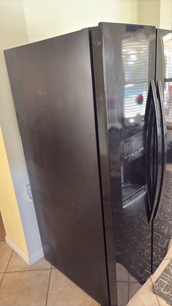 Kenmore Side by side refrigerator