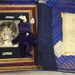 Collectible Princess Diana set. Has a beautiful framed 925 Hallmarked Silver sculpture of Diana. Also comes with a Ty Beanie Baby Princess bear, tags 