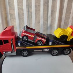 Toy semi truck transporter with fire truck and dump truck