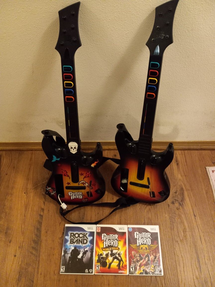 Nintendo Wii Guitar Hero Controllers And Games