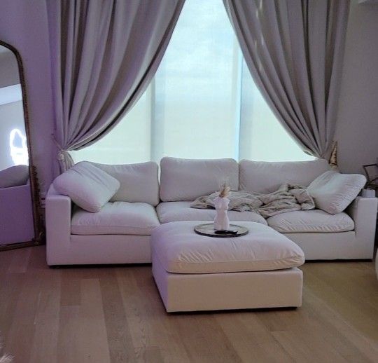 Cream Sofa And Ottoman Orig $4000