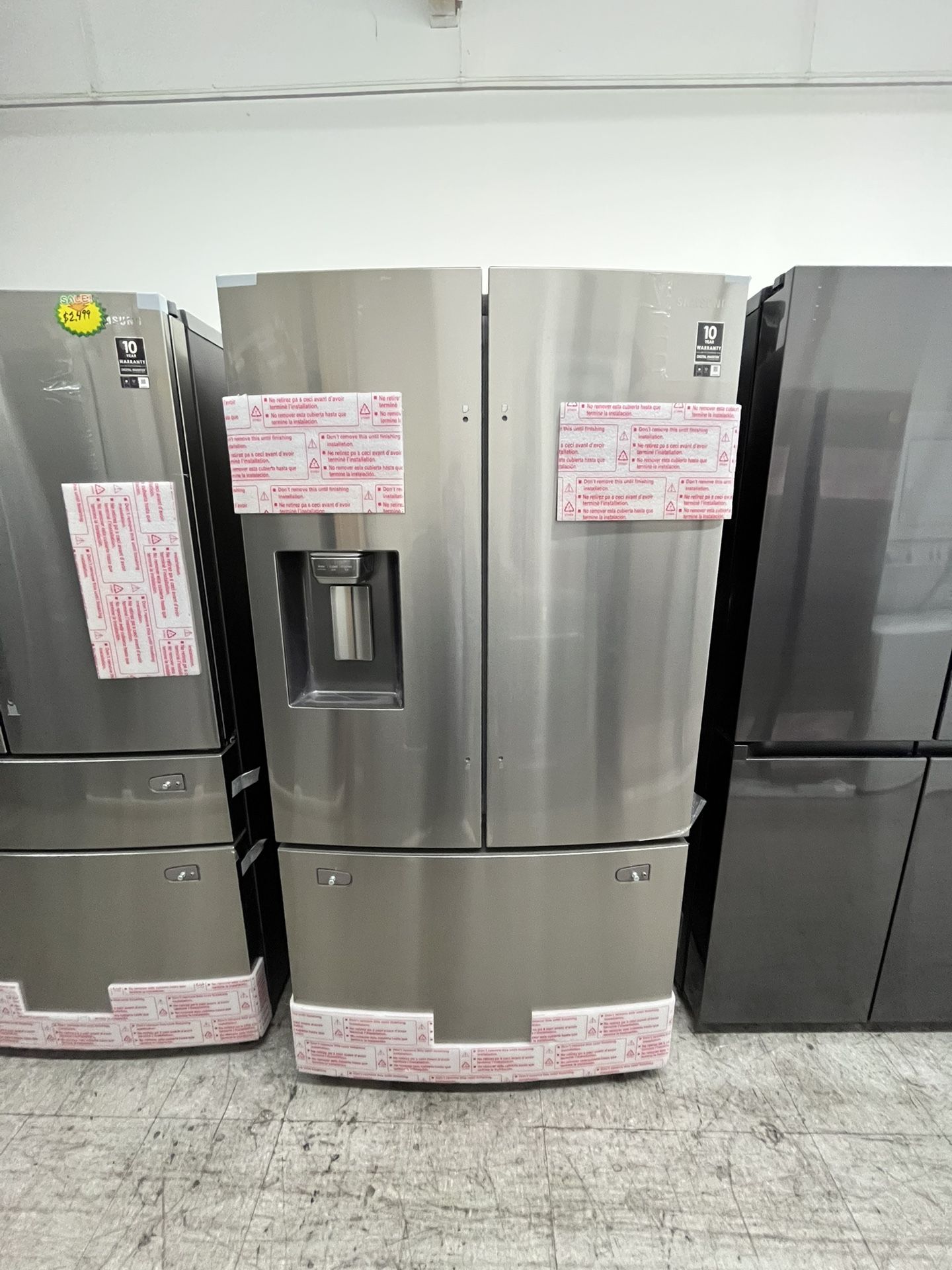 NEW SAMSUNG FRENCH DOOR REFRIGERATOR WITH ICE AND WATER DISPENSER