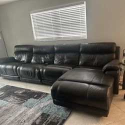 Black leather Couch With   Reclining seats 