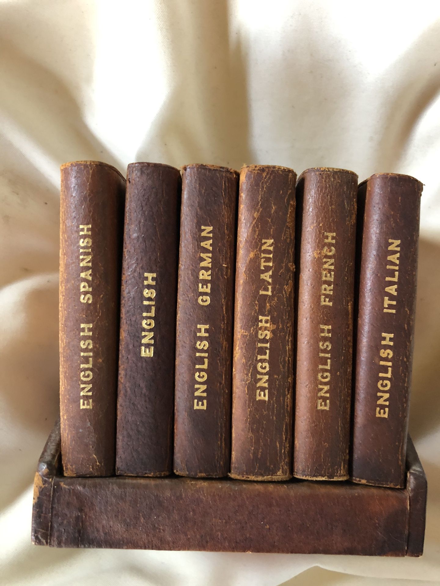Antique Burgess and Bowes Midget Dictionary Set. (6)