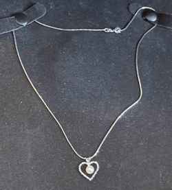 18k WG pearl (Italy)