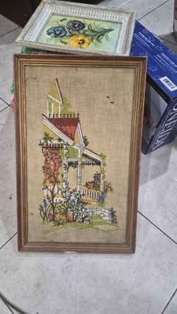 front porch and garden scene hand-embroidered with yarn.