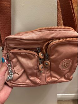 Kipling rose crossbody with metal charm