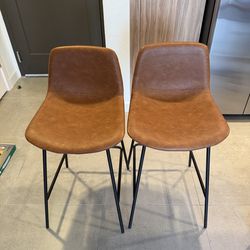 Brown leather barstools