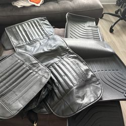 Full Set of Seat Covers and Floor Mats. This is a large set designed to fit a Lexus vehicle. It includes seat covers for both front and rear seats, pl