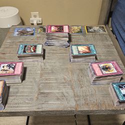 Selling a large mixed collection of Yu-Gi-Oh! and Magic: The Gathering cards
