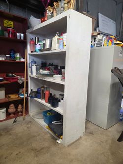 Real wood shelf, roughly 4 feet wide and roughly 5 feet tall