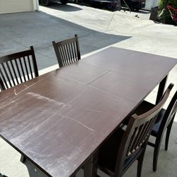 Brown Table And 4 Chairs 