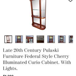 Late 20th century Pulaski furniture Federal style cherry illuminated curio cabinet with lights
