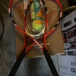 Two Wilson Tennis Rackets With New Balls 