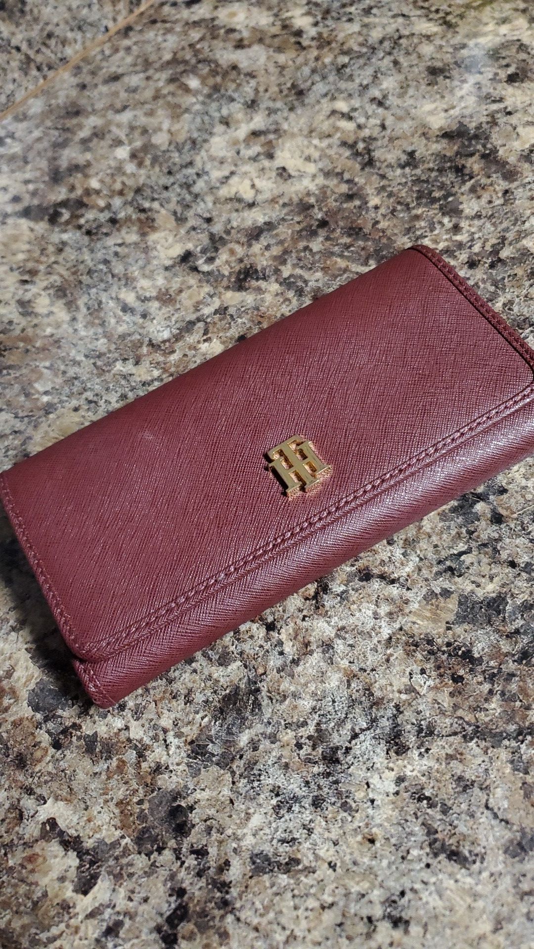 Maroon Tommy Hilfiger wallet.