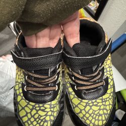 Lighthouse dinosaur shoes with power button