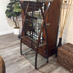 Realspace Merido 4-shelf bookcase with tempered glass shelves and an espresso/silver finish.