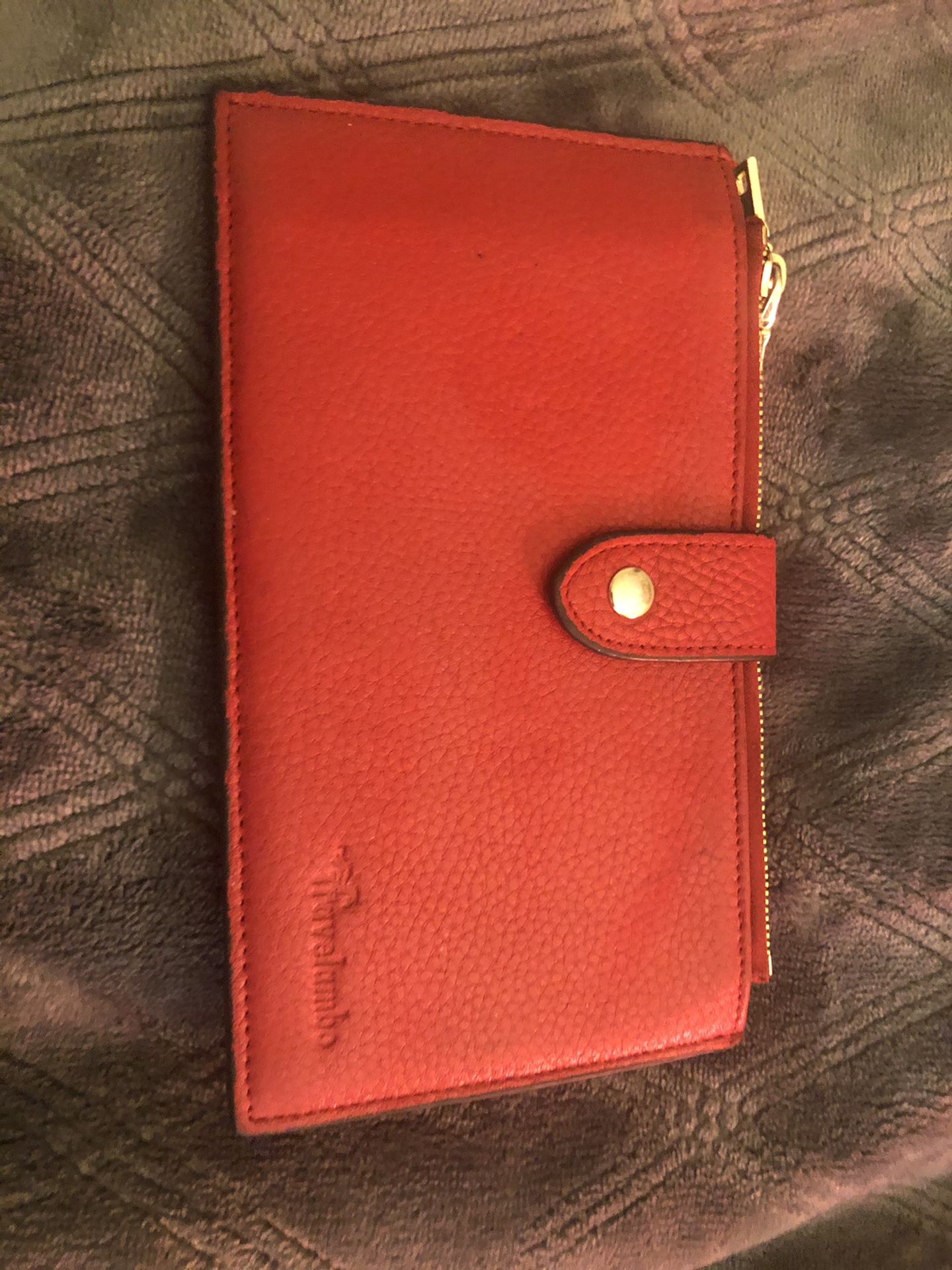 Red wallet with a lot a lot of card holder slots