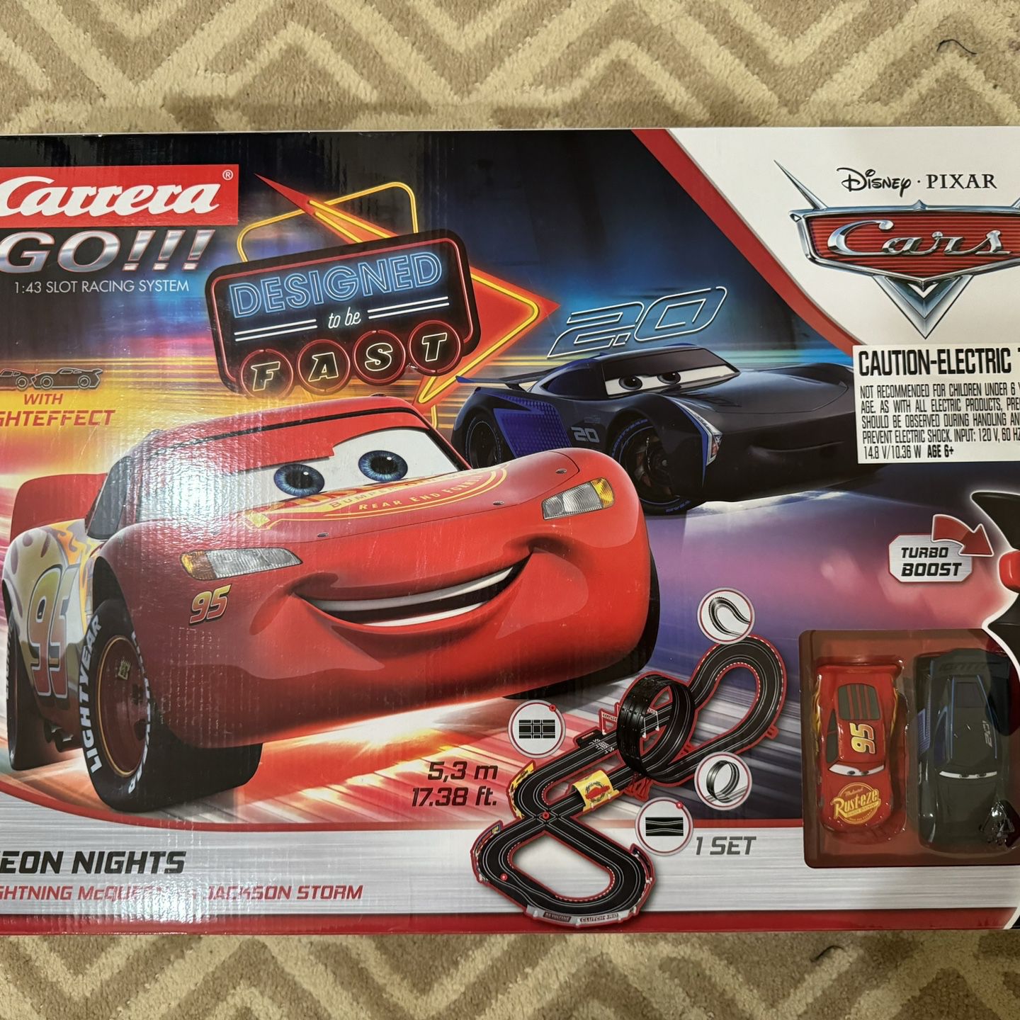 Carrera GO!!! 62477 Disney Pixar Cars Neon Nights Electric Slot Car Racing  Kids Toy Race Track Set Includes 2 Controllers and 2 Cars in 1:43 Scale